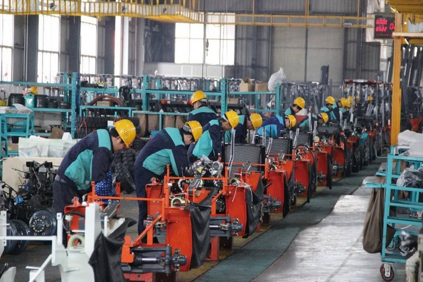 HARMAC quality control engineers inspecting machinery before shipment